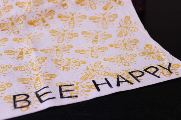 Block printed bee tote bag closeup